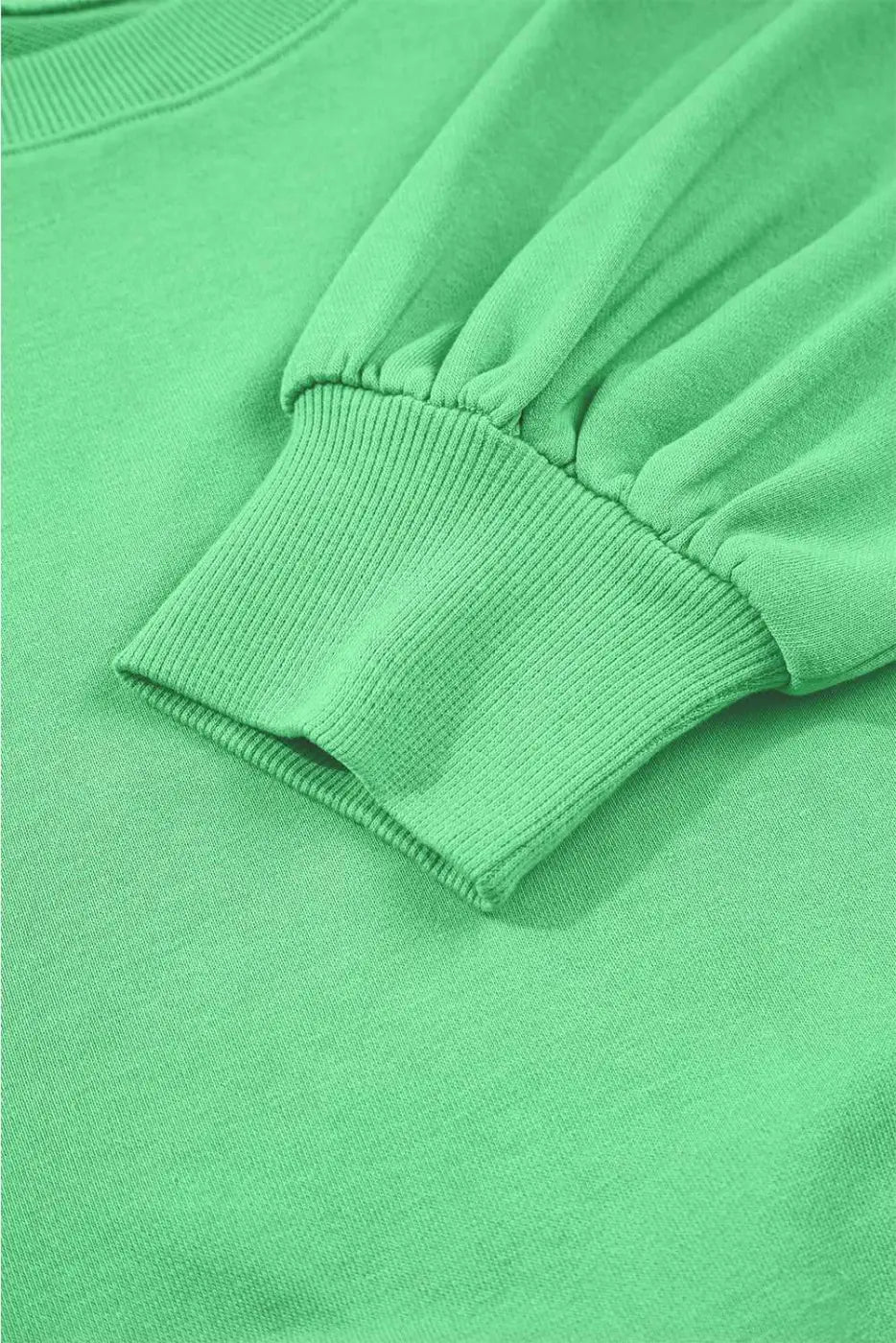 Sleeve cuff detail of green Drop Crop Wide-Leg Pants Set, highlighting ribbed texture and cozy loungewear style.
