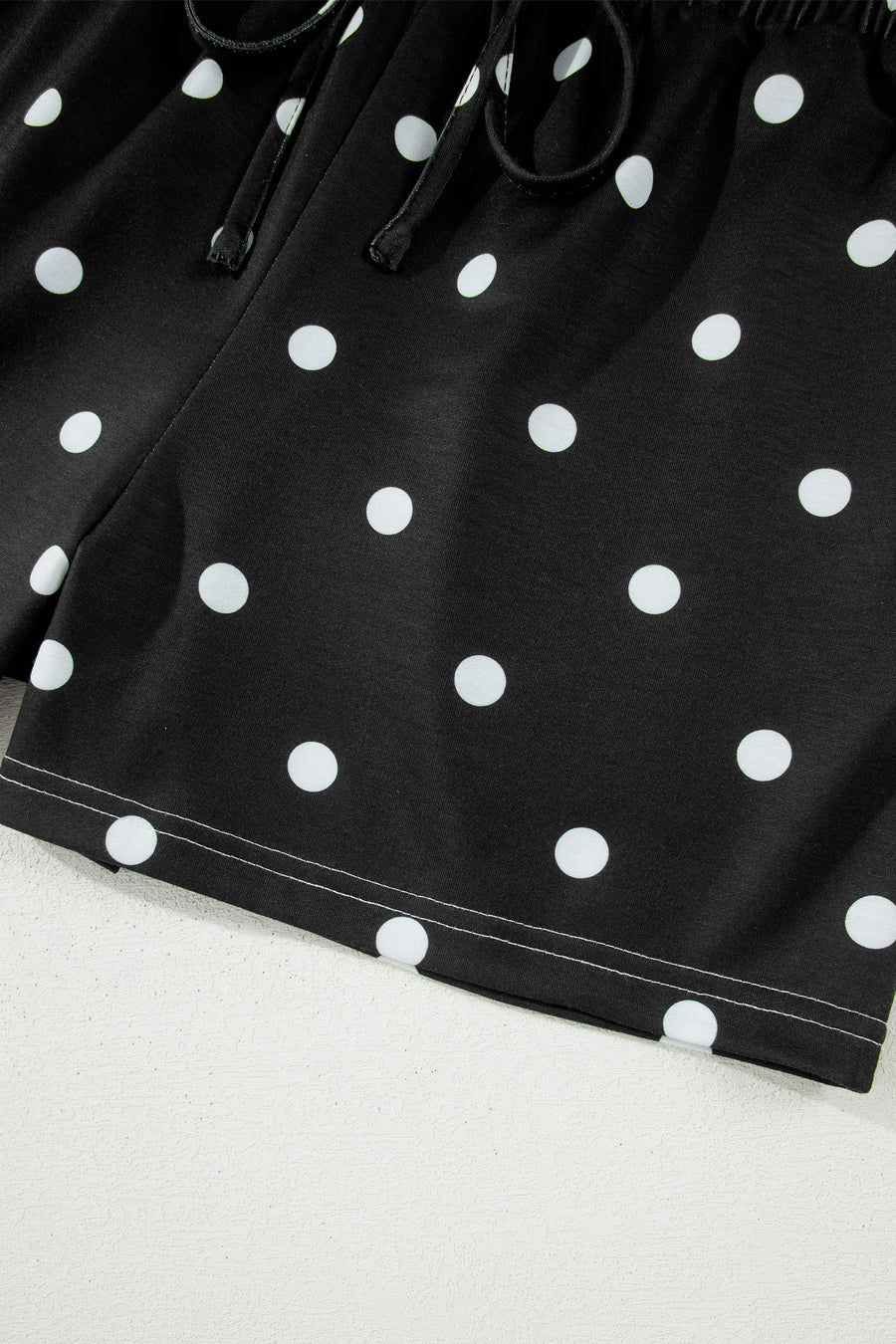 Polka Dot Exposed Seam Loose Tee Drawstring Shorts Two-Piece Set — fabric texture detail | Fashionfitz UK