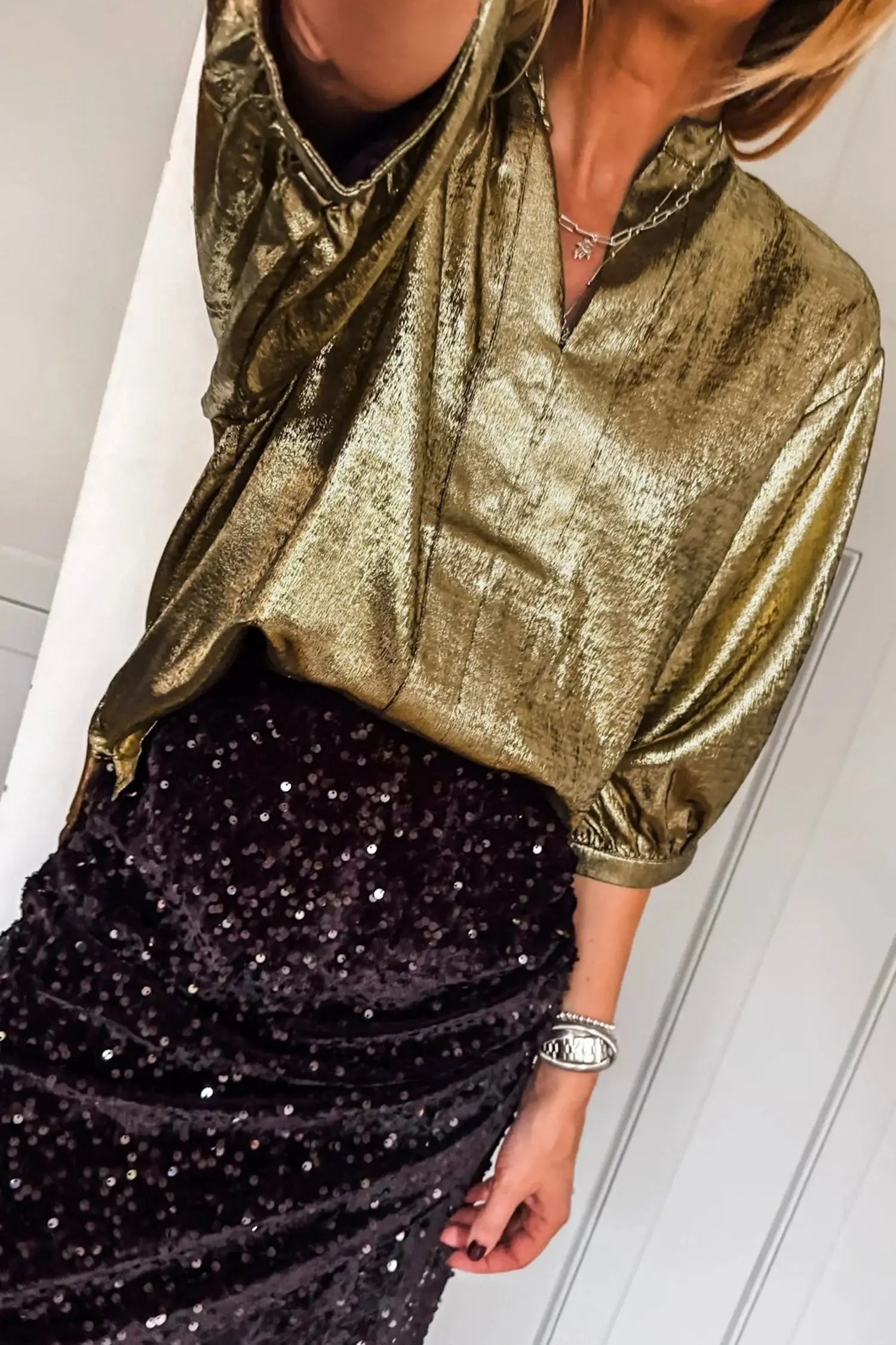 Side view of gold metallic split neck blouse highlighting fabric sheen and relaxed silhouette Fashionfitz UK