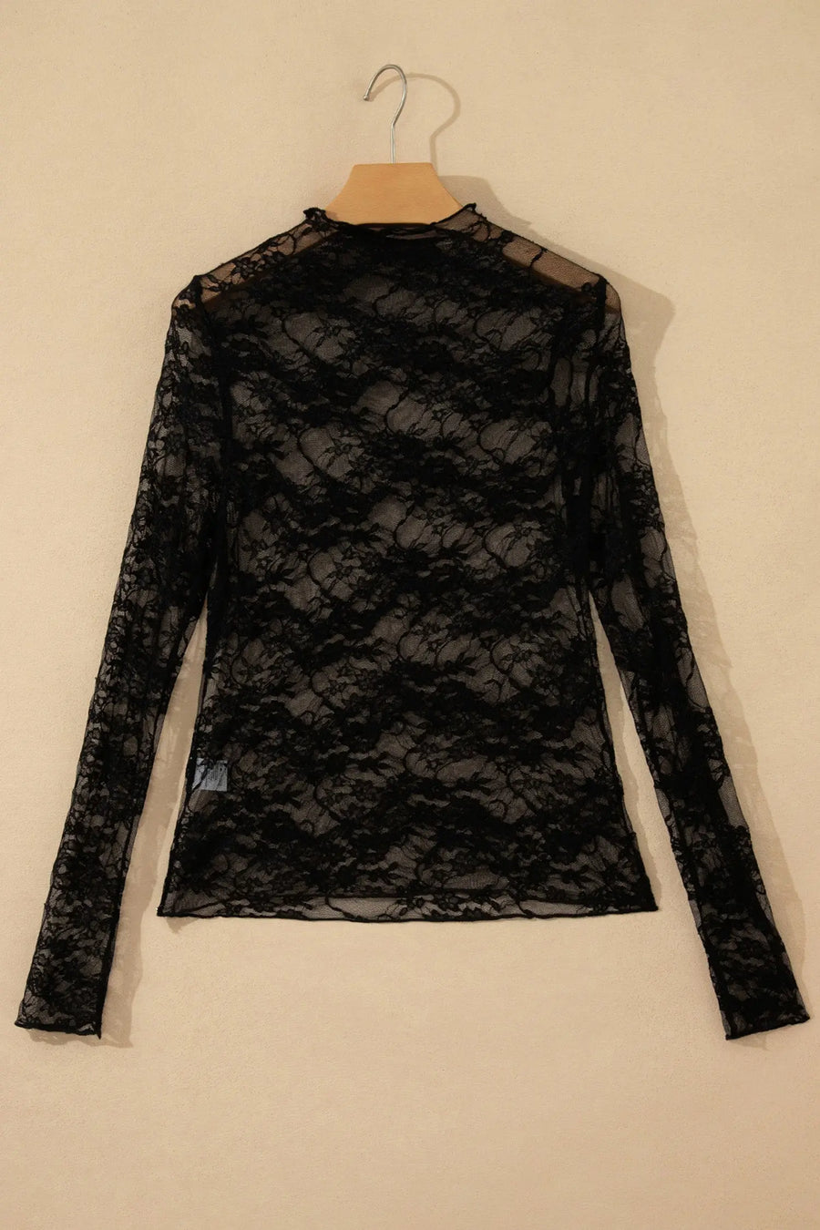 Women's black lace long sleeve top lifestyle shot casual
