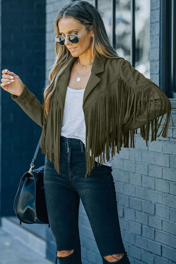 Green cropped fringe faux suede jacket styled with black skinny jeans and sunglasses, perfect for casual fall western-inspired outfits.