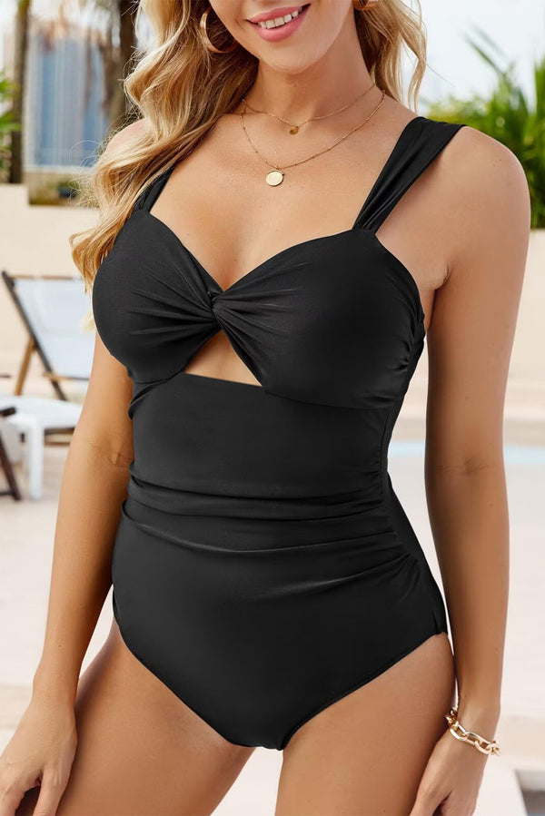 Woman wearing cut out twist bowknot backless one piece swimsuit