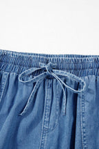 Close-up of drawstring waistband on Plus Size Blue Denim Joggers, emphasizing adjustable fit and elastic comfort for daily wear.