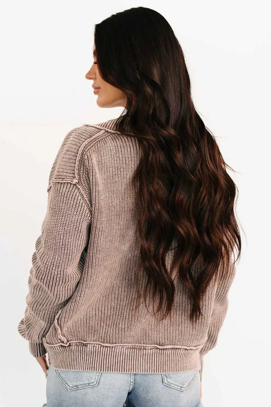 Rear view of woman in brown stonewash knit open cardigan, showing ribbed texture and relaxed fit for daily wear.