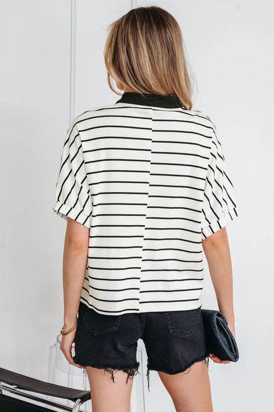 Close-up of elastic cuffs and stripe fabric detail on black dolman top Fashionfitz UK