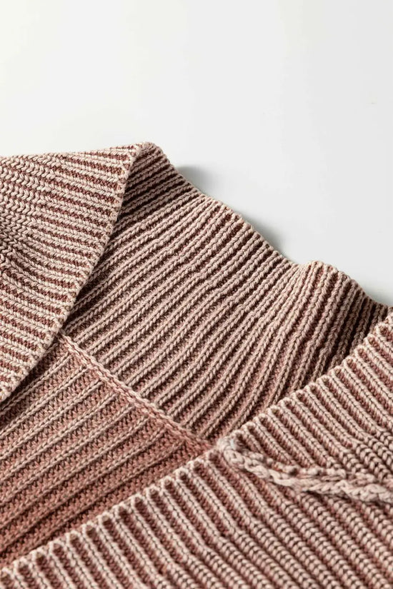 Close-up of collar on brown stonewash patchwork knit open cardigan, showcasing fine ribbed detailing and soft texture.