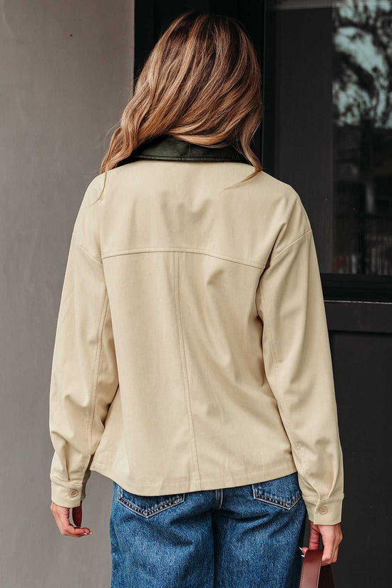 Back view of model in Leather Collar Corduroy Jacket, highlighting relaxed fit and contrast leather collar for autumn style.