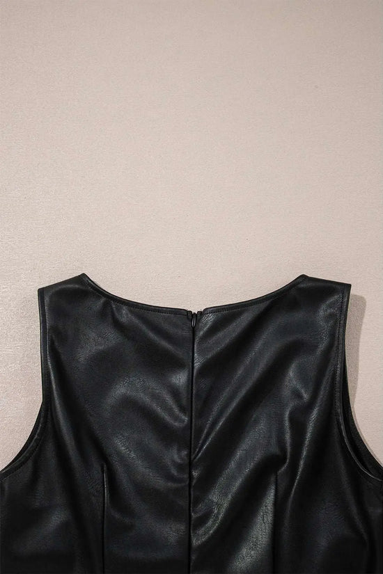 Detailed view of back zipper on Black Vegan Leather Sleeveless Mini Dress, designed for easy wear and seamless style by FashionFitz.
