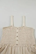 Beige Shirred Playsuit with front buttons and smocked bodice, perfect for a light and breezy casual look in warm weather.