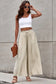 Beige drawstring smocked high waist wide leg pants