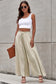 Beige drawstring smocked high waist wide leg pants