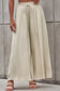 Beige drawstring smocked high waist wide leg pants