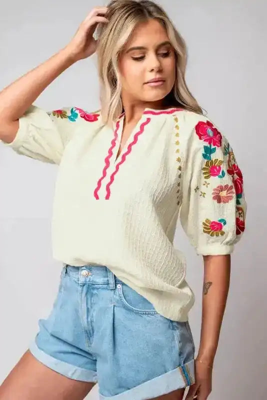 Side view of Beige Floral Embroidered Ricrac Blouse showing puff sleeve structure and relaxed silhouette — Fashionfitz