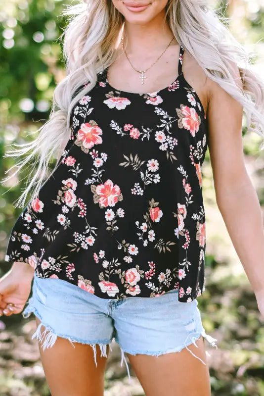 Beige floral strappy back tank top with pink and white flowers on a black background