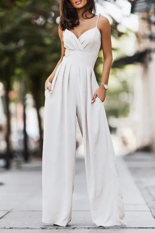 Beige spaghetti straps pleated high waist wide leg jumpsuit - s / 100% polyester - bottoms