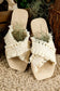 Beige tassel woven crossed straps flat slippers