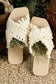 Beige tassel woven crossed straps flat slippers