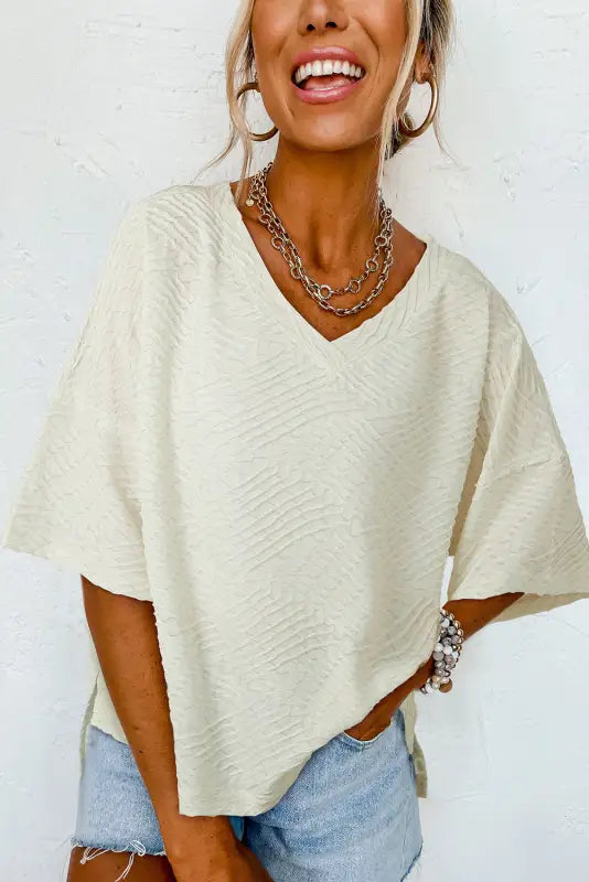 Beige v neck textured split hem oversized top - l / 85% polyester + 10% metallized fibres + 5% elastane - t-shirts