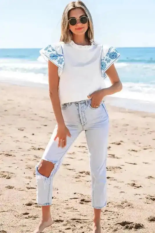 Side view of White Embroidered Ruffled Sleeve Blouse showing frilled collar detail and lightweight drape — Fashionfitz