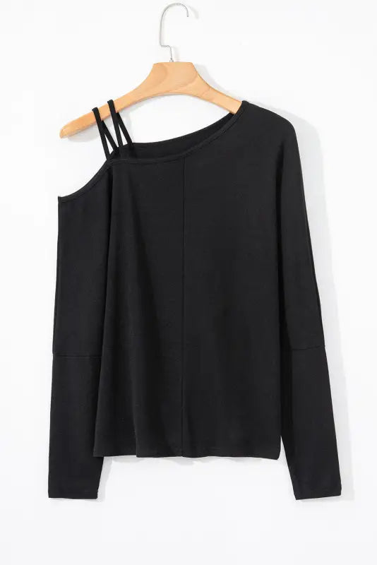 Black asymmetric strappy cold shoulder long sleeve top