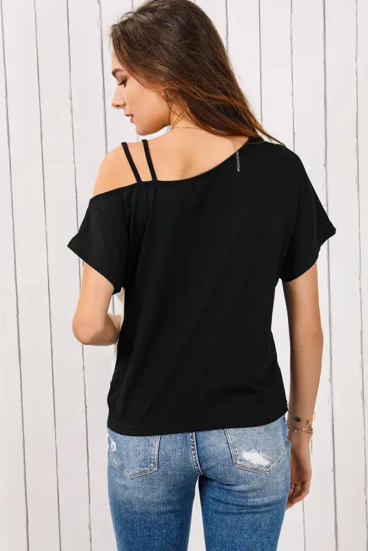 Black asymmetric strappy cold shoulder long sleeve top