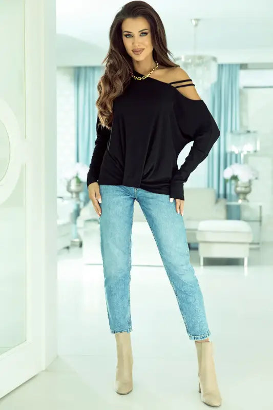 Black asymmetric strappy cold shoulder long sleeve top