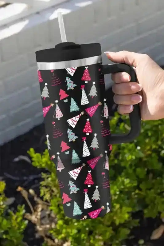 Festive black thermos cup with cartoon Christmas tree print, perfect for seasonal drinks, featuring a large handle and reusable straw.