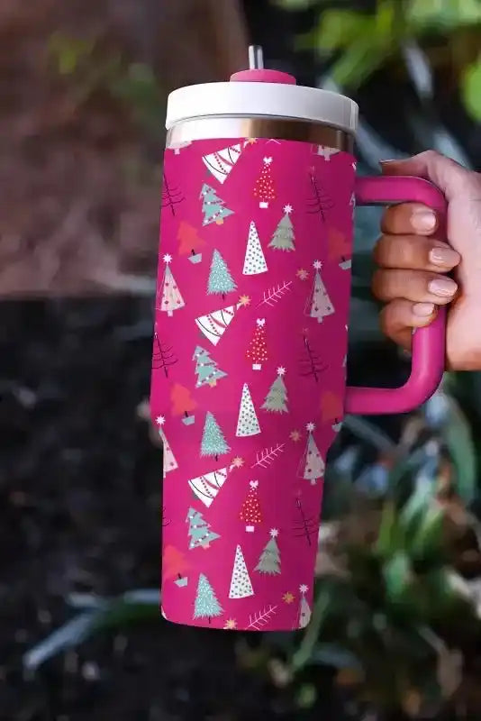 Pink festive thermos cup with cartoon Christmas tree design, ideal for stylish holiday sipping and seasonal gifting.