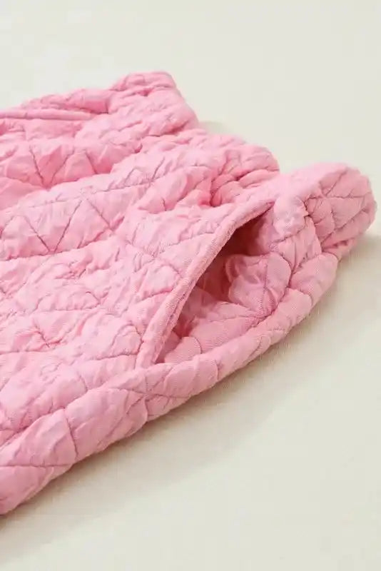 Close-up of pink quilted shorts pocket detail from the Modern Style Quilted Shorts Set - Black, showcasing soft texture and stitching.