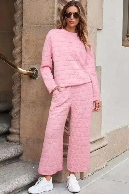 Model wearing full pink Modern Style Quilted Shorts Set - Black with 3/4 sleeves and wide-leg shorts, styled for cozy fashion.