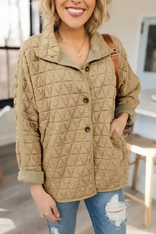 Front view of tan quilted jacket styled with jeans, not part of the Modern Style Quilted Shorts Set - Black collection.