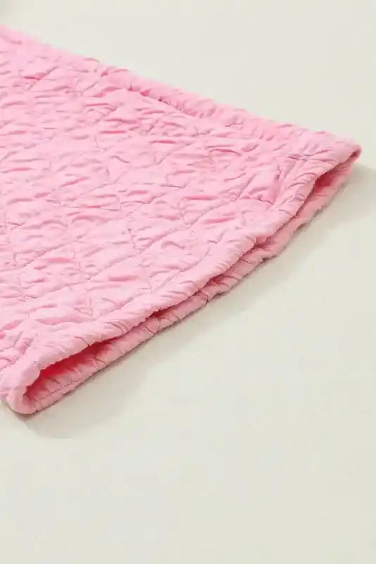 Leg hem detail of pink quilted shorts from the Modern Style Quilted Shorts Set - Black, emphasizing soft and modern loungewear design.