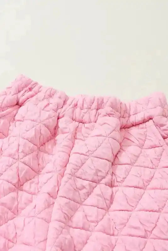 Elastic waistband detail of pink quilted shorts from the Modern Style Quilted Shorts Set - Black, highlighting comfort and fit.