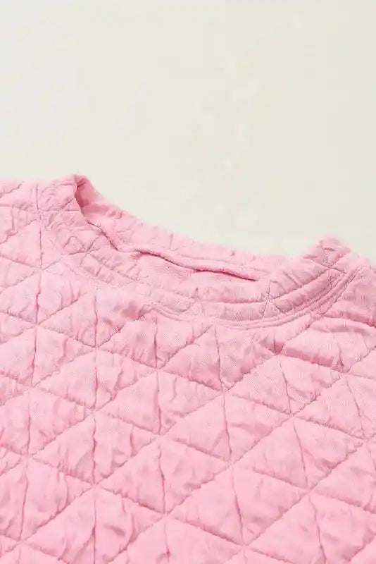 Close-up of pink quilted top neckline with diamond stitching, part of the modern style shorts set for loungewear.