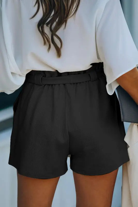 Black cotton blend pocketed knit shorts