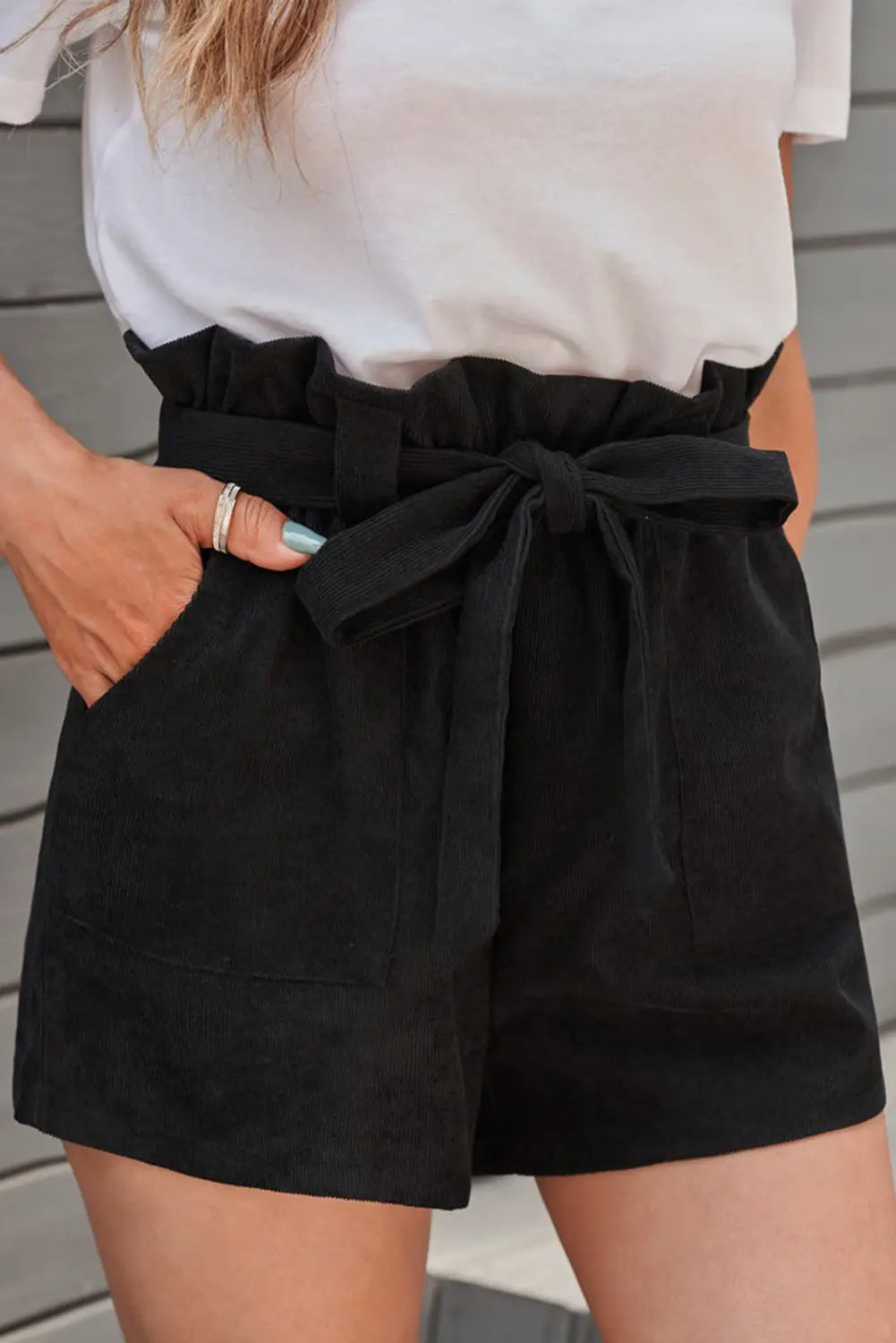 Black cotton blend pocketed knit shorts