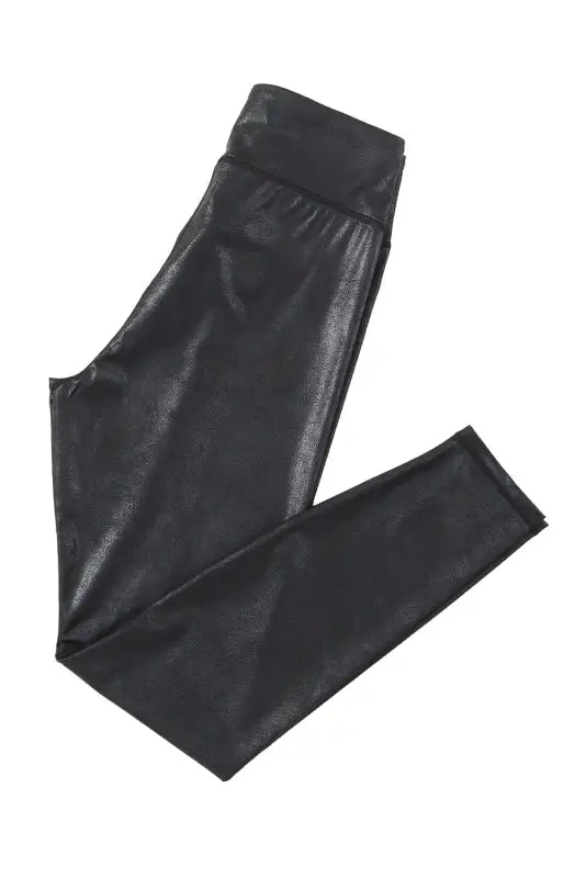 Black crossed dip waist sleek leather leggings