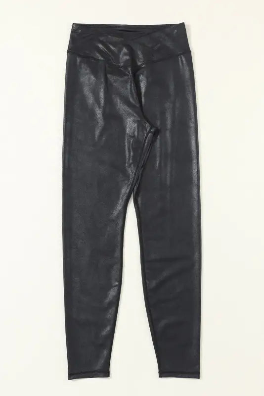 Black crossed dip waist sleek leather leggings