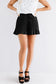 Black drawstring waist flowy pleated shorts