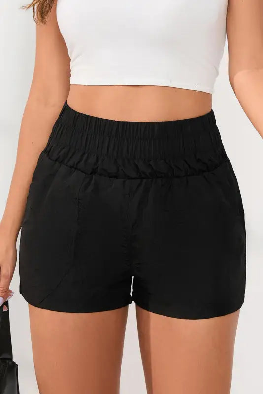 Black elastic high waist side pockets shorts