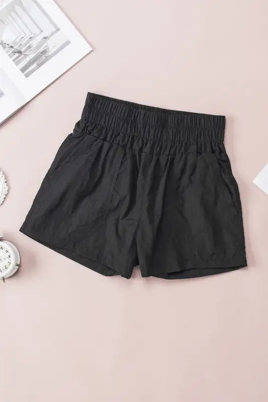 Black elastic high waist side pockets shorts