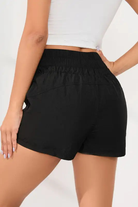 Black elastic high waist side pockets shorts