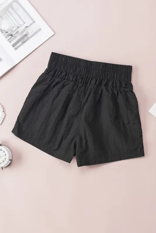 Black elastic high waist side pockets shorts