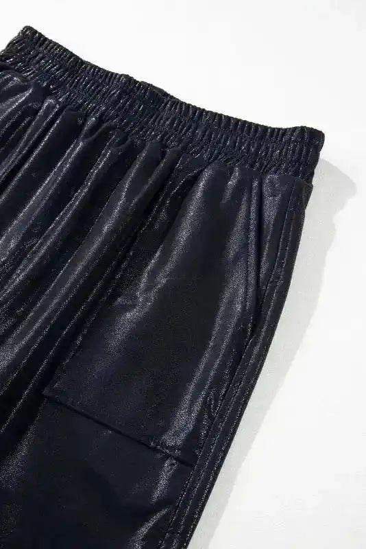 Close-up of the waistband and pocket detail on Black Elastic Waist Pebble Joggers by FashionFitz, emphasizing the textured PU leather fabric.