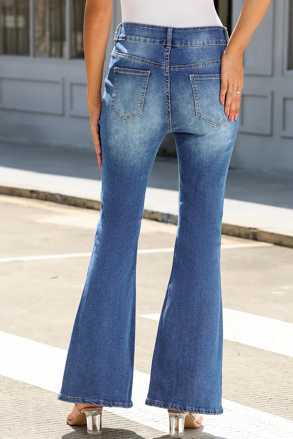 Black exposed seam split flare jeans