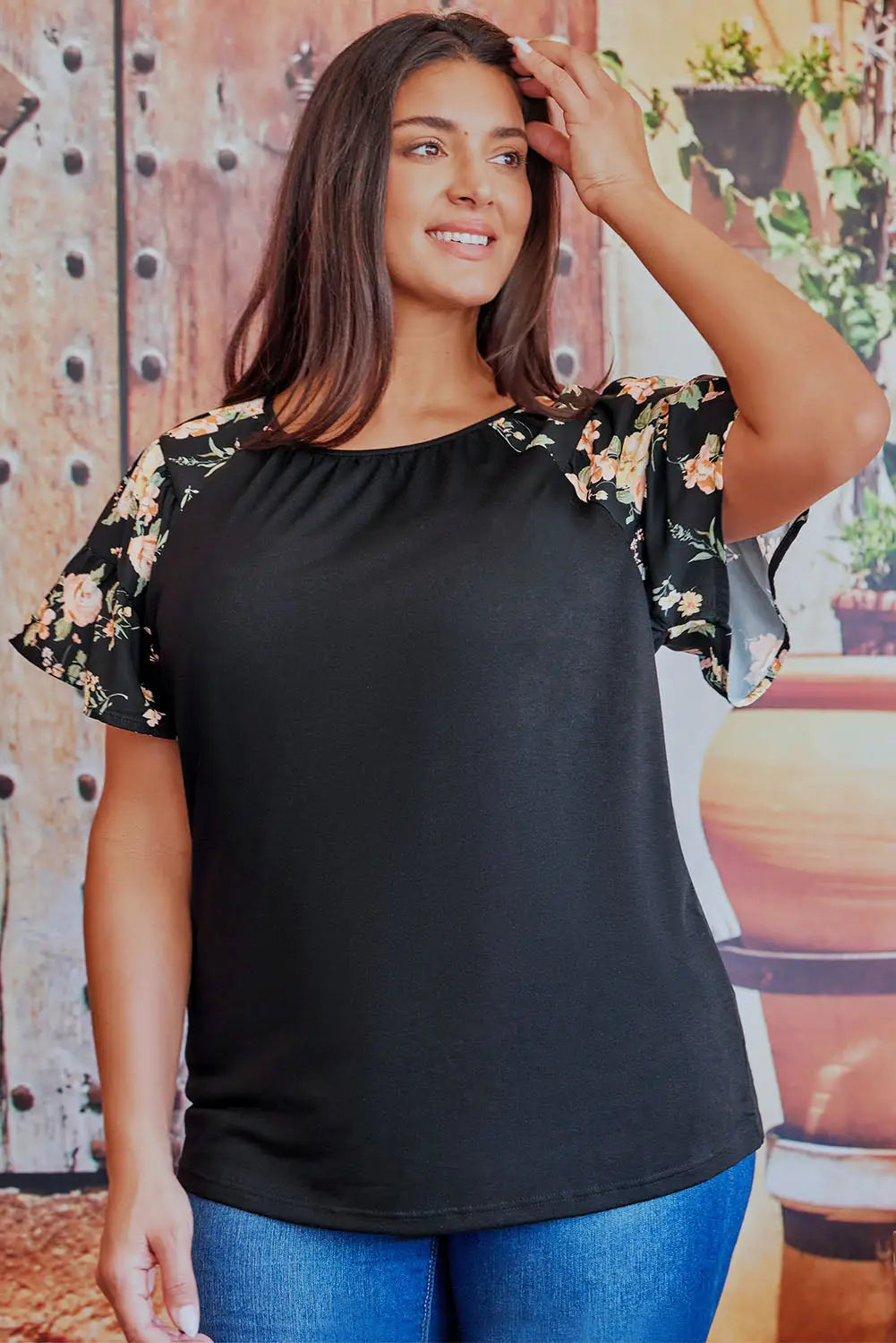 Black floral ruffle sleeve plus size top - 1x /