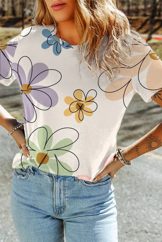 Black floral t shirt - pastel flower print, relaxed fit paired with blue jeans