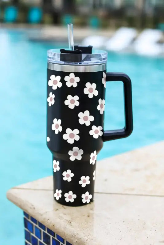 Black floret print stainless tumbler with lid and straw