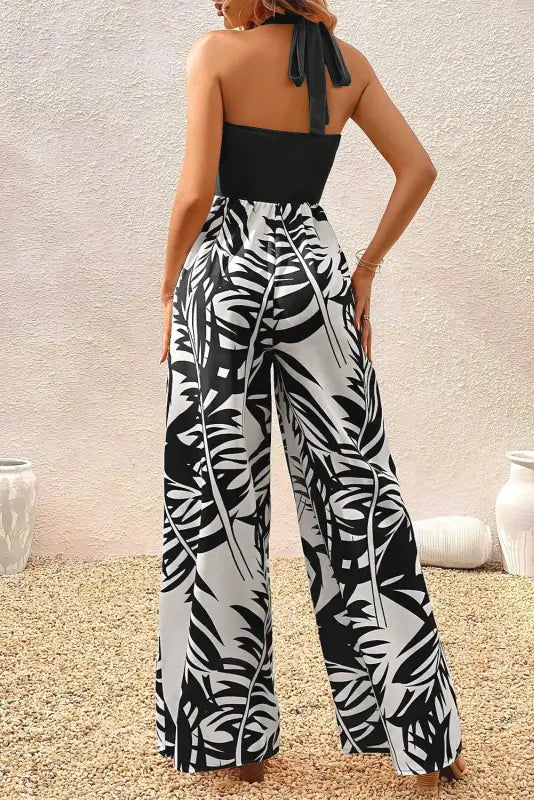 Black halter tropical wide leg jumpsuit - bottoms