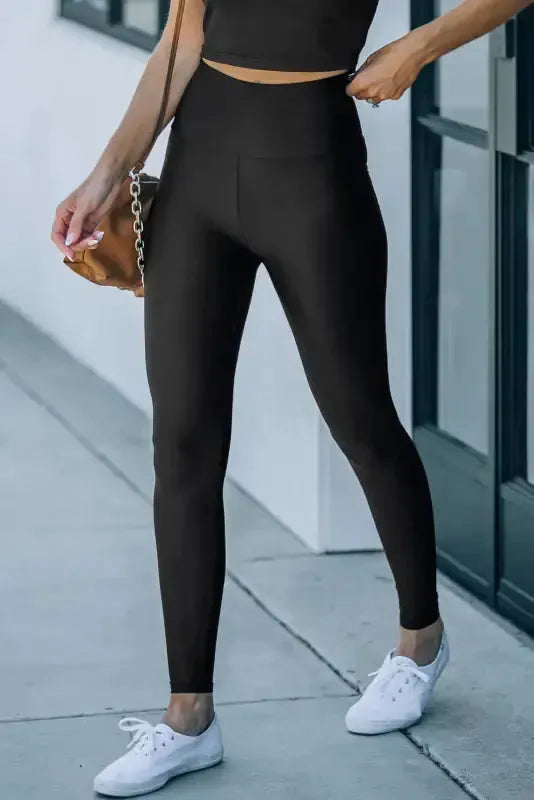 Close-up of wide waist cincher band on black high rise leggings Fashionfitz UK